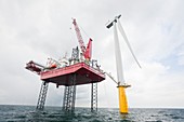 A jack up barge fitting wind turbines