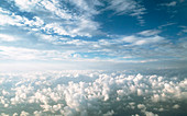 View of stratocumulus clouds over cumulus clouds