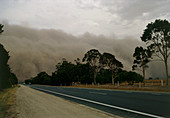 Dust storm over a road