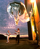 Meteorologist with 'Meduse' weather balloon