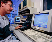 Atmospheric researcher at a laser radar's controls