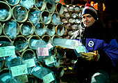 Glaciologist with Vostok ice cores in storage