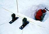 Scientist measures Antarctic ice depth with radar