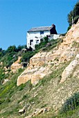House on an eroding cliff edge