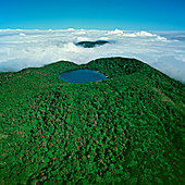 Botos volcano crater lake seen above cloud layer