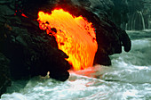 Lava tube emptying into the sea off Hawaii