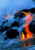 Molten pahoehoe lava flowing into the ocean