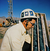 Geologist with core samples