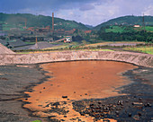 Slag-polluted pool near a steelworks in Spain