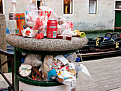 Overflowing litter bin,Venice,Italy