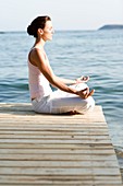 Woman performing yoga exercise