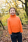 Smiling girl in a wood