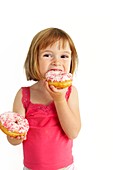 Girl eating doughnuts