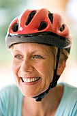 Cyclist wearing a helmet