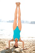 Woman doing a headstand