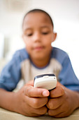 Boy using a mobile phone