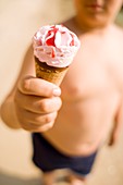 Boy holding an ice cream