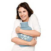 Woman with a hot water bottle