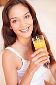 Woman drinking fruit juice