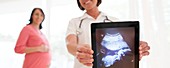 Nurse with baby scan