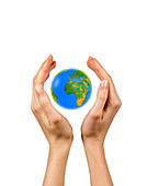 Person holding the globe in their hands