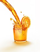 Orange juice being poured into a glass