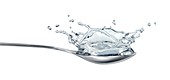 Spoon with water splashing,artwork