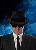 Man wearing sunglasses and black hat