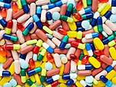 Coloured capsules and tablets