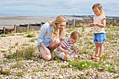 Mother with children on beach