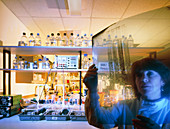 Technician in laboratory prepares DNA fingerprint
