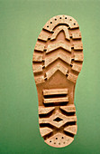 The sole of an antiskiding walking shoe