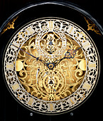 Face of an antique skeleton clock,showing gearing