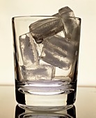 View of a glass of ice cubes