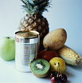 Fruit and vegetables by a steel can
