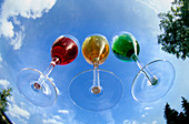 Glasses of coloured liquid
