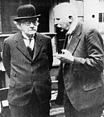 The physicists J J Thomson and Ernest Rutherford