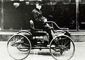 Henry Ford riding on his 1896 motor quadricycle