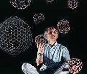 Prof H. Kroto with models of Buckyballs