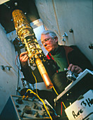 Professor George Pickett with his cryostat