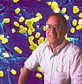 Prof. William Schopf with bacteria SEM background