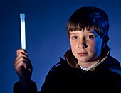 Boy holding a chemical lightstick