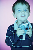 Boy with digital camera