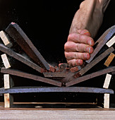 High-speed photo of karate chop on roofing tiles