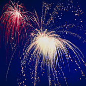 View of an aerial firework display in the evening