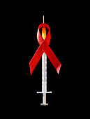 Drug abuse and AIDS: red ribbon around syringe