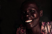 Smiling HIV-positive woman
