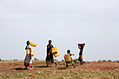 Refugees fetching water,Uganda