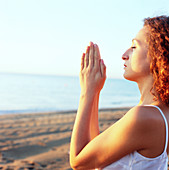 Thoughtful woman meditating