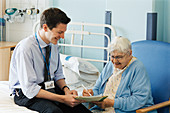 Doctor and elderly patient